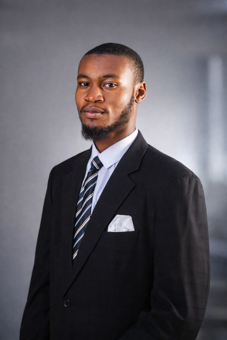 confident professional headshot in a suit